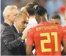  ?? ATTILA KISBENEDEK/AFP/GETTY IMAGES ?? Coach Roberto Martínez and forward Michy Batshuayi will try to lead Belgium to its first World Cup championsh­ip. Belgium plays Japan on Monday in the round of 16.