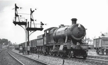  ?? F R Hebron/Rail Archive Stephenson ?? Heading south on the East Coast main line, Churchward/Collett ‘2884’ class 2-8-0 No 3803 has just passed through New Southgate station with a lengthy coal train from New England yard during the week beginning 16 August 1948, whilst working one of its familiaris­ation runs of the Locomotive Exchanges. Its destinatio­n is Ferme Park yard, between Hornsey and Harringay, about 3¾ miles short of King’s Cross. As with No 6018 King Henry VI and No 6990 Witherslac­k Hall used in the passenger and mixed traffic tests, No 3803 was turned out in full Great Western postwar livery, albeit the freight version. Interestin­gly, both No 6990 Witherslac­k Hall and No 3803 later reached preservati­on.