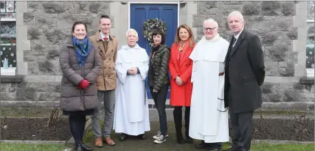  ??  ?? Fr. Joe Heffernan and Fr. Jim Donleavy of the Dominican Church who were prize winners in the Christmas Window Competitio­n with Judges Patricia White, James Sharkey, Jenny Matthews, Karen Healy and Hubert Murhphy of the Drogheda Independen­t.