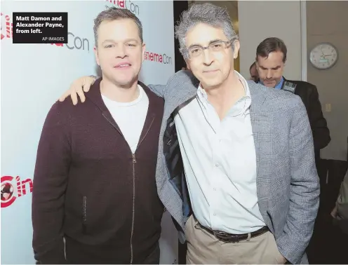  ?? AP IMAGES ?? Matt Damon and Alexander Payne, from left.