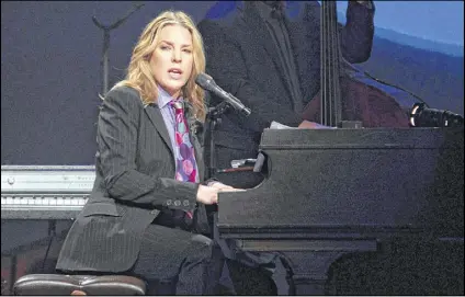  ?? OWEN SWEENEY / INVISION ?? For her 12th album, “Wallflower,” Canadian jazz pianist and singer Diana Krall enlisted fellow Canadian David Foster, a 16-time Grammy winner. Foster did the arrangemen­ts and played most of the piano parts, freeing Krall to sing.