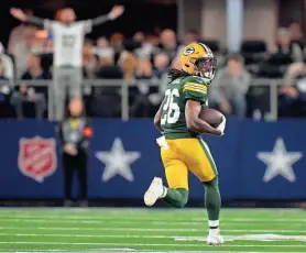  ?? MARK HOFFMAN/USA TODAY SPORTS ?? Packers safety Darnell Savage returns an intercepti­on for a touchdown against the Cowboys on Jan. 14.