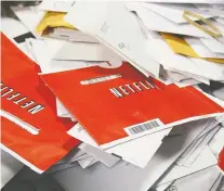  ?? JUSTIN SULLIVAN/GETTY IMAGES ?? At the beginning of the decade, Netflix mailed DVDS rather than streaming them directly to TV.