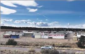  ?? CLYDE MUELLER THE NEW MEXICAN ?? Vendors heard news of the Tesuque Flea Market’s closure from managers just three weeks before the usual opening.