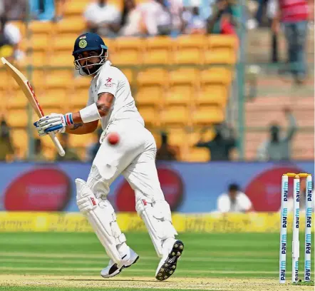  ?? — AFP ?? Not cool: India captain Virat Kohli has come under scrutiny both over his form and his conduct after his outburst against Australia’s Steve Smith at the end of the second Test in Bangalore.