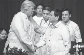  ??  ?? President Trump and Philippine­s President Rodrigo Duterte seemed to hit it off when they met several times on Trump’s Asia trip. ANDREW HARNIK/AP