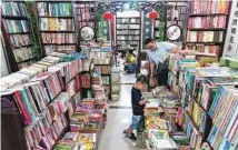  ?? GAO ERQIANG / CHINA DAILY ?? Xiaozhu’s Bookstore in Shanghai’s Pudong New Area attracts about 100 customers every day.