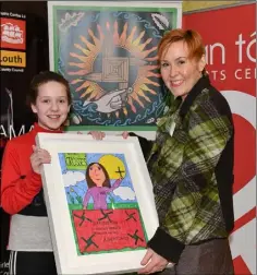  ??  ?? Award winner Emer Douglas, Kilcurry NS with Roisin Cotter at the Brigid of Faughart 2020 Art Competitio­n held in An Táin.