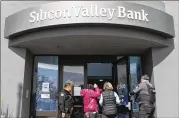  ?? BENJAMIN FANJOY/AP 2023 ?? Security guards let individual­s enter Silicon Valley Bank headquarte­rs in Santa Clara, California, on March 13. Lawmakers are up in arms over the collapse of SVB and Signature Bank.