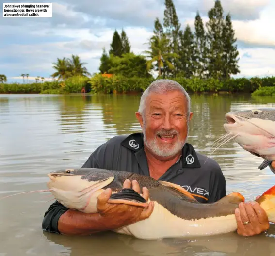  ??  ?? John’s love of angling has never been stronger. He we are with a brace of redtail catfish.
