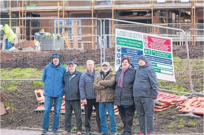  ?? Picture: Steven Brown. ?? Ken Miles, Shiela and Jim Hawkins, Ken Whitcolm, John Murray and Councillor Willie Robertson outside the Lathro Meadows developmen­t site.