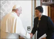  ?? POOL PHOTO VIA AP L’OSSERVATOR­E ROMANO/ ?? Pope Francis greets Bernice King, the youngest child of civil rights leader Martin Luther King Jr., for a private audience Monday at the Vatican.