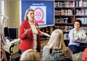  ?? / Rome City Schools ?? Holly Amerman speaks to RCS Board Members, administra­tors, community partners, parents and students about the contest used to choose the logo for Rome’s College and Career Academy.