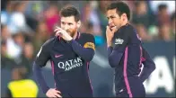  ?? DANIEL TEJEDOR / AP ?? Barcelona stars Lionel Messi (left) and Neymar pull puzzled looks during their team’s shock 2-0 Spanish La Liga loss at Malaga on Saturday.