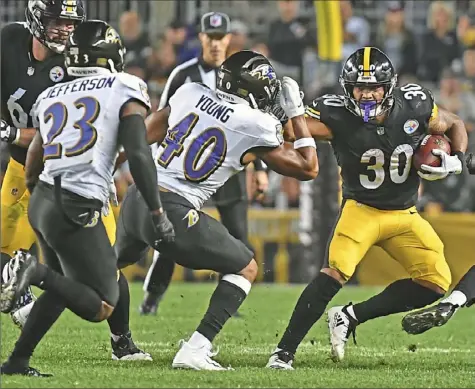  ?? Peter Diana/Post-Gazette ?? The Ravens held the Steelers to 19 yards rushing Sept. 30 at Heinz Field — the fifth-lowest one-game total in Steelers franchise history.