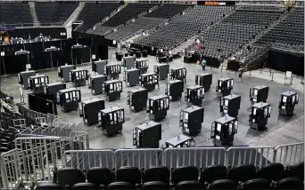  ?? BRYNN ANDERSON — THE ASSOCIATED PRESS ?? In this Monday, Oct. 12, 2020 file photo, voting machines fill the floor for early voting at the State Farm Arena in Atlanta.