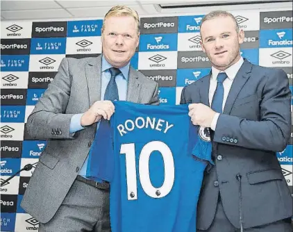  ?? FOTO: GYI ?? Wayne Rooney sostiene su camiseta con Ronald Koeman Confesó que su familia está encantada de volver a verle jugando de azul