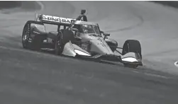  ?? STACY REVERE/GETTY IMAGES ?? Scott Dixon qualifies for the NTT IndyCar Series Rev Group Grand Prix Race 1 at Road America on Saturday.