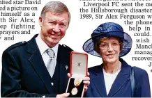  ??  ?? HONOUR: Sir Alex with wife Cathy after he was knighted in 1999