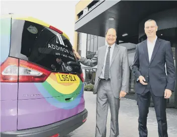  ??  ?? Addison Lee chief executive Andy Bond, right, with Shailesh Vara, MP for North West Cambs.