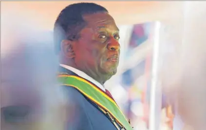  ??  ?? Same old: Many poor Zimbabwean­s are doubtful that Emmerson Mnangagwa’s rule will bring much in the way of change and equal opportunit­ies. Photo: Jekesai Njikizana/AFP