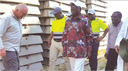  ?? Picture by Africa Moyo ?? Transport and Infrastruc­tural Developmen­t Minister Dr Joram Gumbo touring Fort Concrete’s operations in Gweru last Friday. He is accompanie­d by Diaspora Infrastruc­ture Developmen­t Group (DIDG) and Aveng Infraset officials.