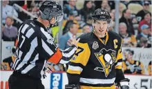  ?? ASSOCIATED PRESS FILE PHOTO ?? Pittsburgh Penguins' Sidney Crosby, right, listens to ref Garrett Rank during a game against the Detroit Red Wings on Feb. 19, 2017.