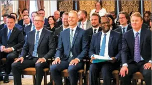  ?? THE CANADIAN PRESS/Jason Franson ?? Front row from left, Travis Toews, Nathan Neudorf, Kaycee Madu and Tyler Shandro wait to be sworn into cabinet in Edmonton, Monday, Oct. 24, 2022.