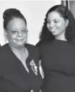  ??  ?? Maya Wheeler, right, president of Colorado BlackWomen for Political Action, and Sharon Bailey, who was honored for her community service.