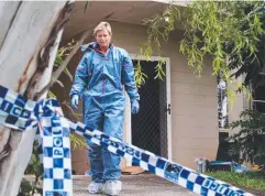  ??  ?? TRAGIC EVENTS: Police attend the crime scene at a Herald St home in Bentley Park, last year, investigat­ing the death of China Crawford.