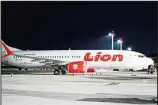  ?? ?? Lion Air’s Boeing 737 Max 8 sits on the tarmac at Ngurah Rai Internatio­nal Airport in Bali, Indonesia, April 13, 2019. (AP)
