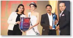  ??  ?? The award was given to Crowne Plaza New Delhi Rohini and received by
Srishti S. Narula, AM - PR & Marketing and Sarad Upadhyay, General Manager