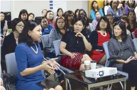  ??  ?? The author (first row, leftmost) in a forum hosted by Citi women for women, where participan­ts were challenged to aspire to be CEOs.