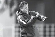  ?? BUDDHIKA WEERASINGH­E / GETTY IMAGES ?? Coach Fabio Cannavaro of Guangzhou Evergrande gestures during Wednesday’s AFC Champions League Group G match against Cerezo Osaka in Osaka, Japan.