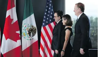  ?? AFP/ GETTY IMAGES ?? Mexico’s Secretary of Economy Ildefonso Guajardo Villarreal, Canada’s Foreign Affairs Minister of Chrystia Freeland and U.S. Trade Representa­tive Robert Lighthizer in Ottawa last fall. Key for Canada’s NAFTA negotiator­s is to fight against U.S....