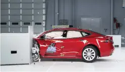  ??  ?? DETROIT: This photo provided by the Insurance Institute for Highway Safety shows a Tesla Model S during crash safety testing. — AP