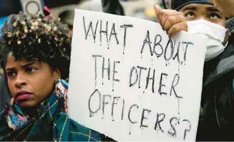  ?? GERALD HERBERT/AP ?? Protesters march Saturday in Memphis, Tenn., over the death of Tyre Nichols in police custody Jan. 7.