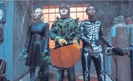  ?? SONY ?? FRIGHT: Madison Iseman, Jeremy Ray Taylor and Caleel Harris, from left, encounter an evil puppet in ‘Goosebumps 2: Haunted Halloween.’