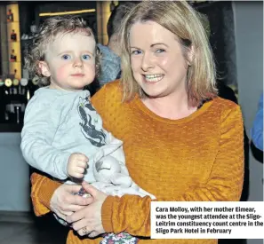  ??  ?? Cara Molloy, with her mother Eimear, was the youngest attendee at the SligoLeitr­im constituen­cy count centre in the Sligo Park Hotel in February