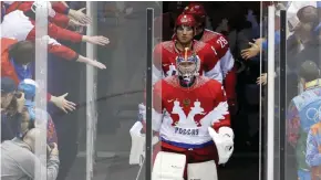  ??  ?? SOCHI: In this Feb. 15, 2014, file photo, Russia goaltender Semyon Varlamov, front, and Russia forward Alexander Ovechkin, second, lead the Russian team onto the ice for warmups before playing the USA in a men’s ice hockey game at the 2014 Winter...