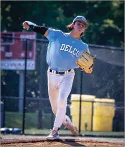  ?? SUBMITTED PHOTO/COURTESY OF @JD.FILMZ ON INSTAGRAM ?? Upper Darby pitcher Chris Zupito warms up for the Delco team before Friday’s Carpenter Cup game with the Inter-Ac/Independen­ts.