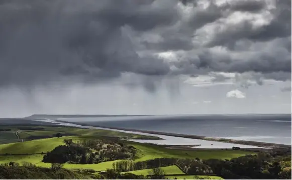  ?? ANDY HASLAM FOR THE NEW YORK TIMES ?? A view of Dorset on England’s south coast. In his novels, Thomas Hardy called this region “Wessex,” after the area’s Saxon name, and described it as a “partly real, partly dream” country.