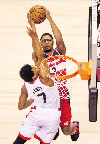  ?? PETER J. THOMPSON ?? Kyle Lowry and fellow Toronto guard DeMar DeRozan took care of the bulk of the scoring against Bradley Beal and the Washington Wizards in a 108-98 Game 5 win at the Air Canada Centre Wednesday.