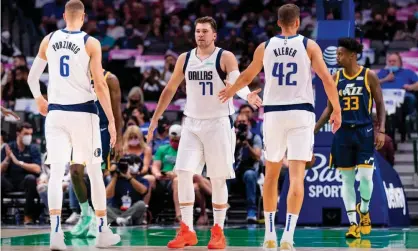  ?? Photograph: Jerome Miron/USA Today Sports ?? Kristaps Porzingis, Luka Doncic and Maxi Kleber are important pieces for the Mavericks, with Doncic one of the league’s finest players.