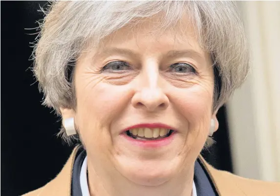  ?? Dominic Lipinski ?? > Prime Minister Theresa May insists the UK’s trade deal with the European Union ‘can be agreed within the two-year Brexit timeframe’