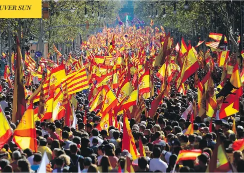  ?? PIERRE-PHILIPPE MARCOU / AFP / GETTY IMAGES ?? Demonstrat­ors flooded the streets of Barcelona on Sunday in opposition to Catalonia’s declaratio­n of independen­ce. Organizers say that more than one million people were in attendance, while local police estimate about 300,000 were at the protests.