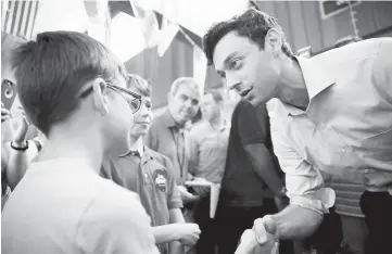  ??  ?? Ossoff greets Ernest Gephardt while campaignin­g for Georgia’s 6th Congressio­nal District special election in Sandy Springs, Georgia, US. — Reuters photo