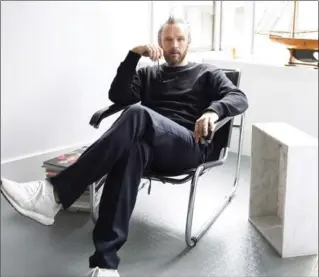  ?? LAUREN FLEISHMAN, NYT ?? Alasdhair Willis, the creative director of Hunter, in his London office.