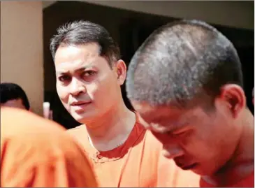  ?? HONG MENEA ?? Suth Dyna, former Cambodian ambassador to South Korea, was sentenced to five years’ jail and a 5 million-riel fine at the Phnom Penh Municipal Court yesterday.