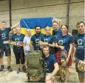  ?? GINSBURG FAMILY FOUNDATION ?? Members of Razom, a nonprofit aiding Ukraine, deliver supplies to the wartorn country’s Kharkiv region on Sept. 20, thanks to funds raised at the Ukraine Ballet Benefit in Orlando.